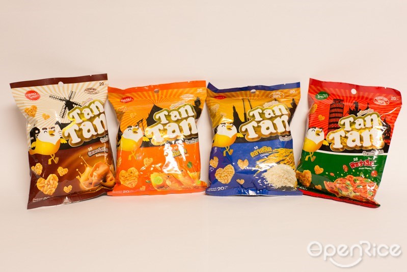 Tantansnack (แต๋นแต๋น) ขนมข้าวกรอบรูปหัวใจสุดน่ารัก (ผลิตจากข้าวเหนียว) ปลอดผงชูรส ปลอดกลูเตน ปลอดสารกันบูด ราคาขาย 20 บาท ขนาด 20 กรัม มีทั้งหมด 4 รสชาติ ได้แก่ รสพิซซ่า รสบัตเตอร์สก็อต รสคลาสสิก รสต้มยำ